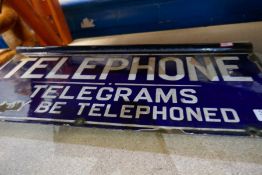 An old enamelled sign, double sided for telephone (telegrams may be telephoned)