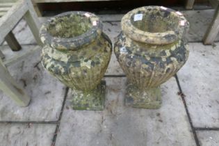 A small pair of garden urns