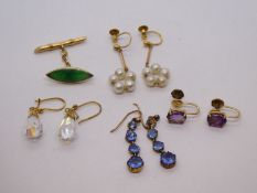 Collection of 9ct yellow gold earrings including amethyst examples and bamboo cufflink