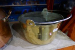 An old brass bucket having iron handle and various copper ware