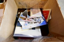 Four boxes of Worldwide stamps in albums, pages and loose