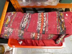 Box of old carpet and other fabric