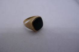 9ct yellow gold signet ring with large black panel, marked 9ct, size U, 7.1g approx