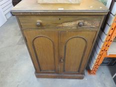 A Victorian Mahogany cupboard having one long drawer