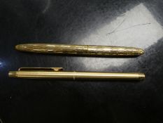 Vintage gold plated 'Shaeffer' fountain pen and a Papermate example