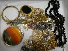 Tray of vintage necklaces, box of earrings including enamelled gilt examples, yellow metal clip on c