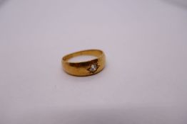 18ct yellow gold gypsy ring with single diamond, size Q, marked 18, 4.5g approx