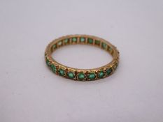 9ct yellow gold emerald set full eternity ring, size R, marked 375, 1.7g approx