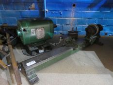A small lathe, with AC motor and a tray of assorted tools