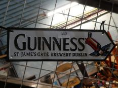 Guiness Arrow sign