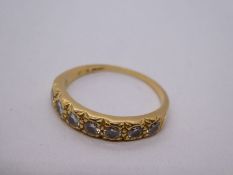18ct yellow gold, half eternity ring, set with 7 brilliant cut diamonds, marked 750, size Q, 3.2g ap