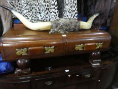 A 1930s oak sideboard cut down to media stand height