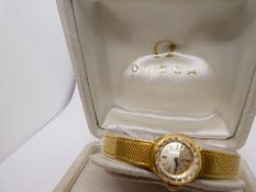 An 18ct gold ladies 'OMEGA' dress watch, in its original box, possibly 1960s value of gold content a