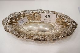 A Victorian silver pierced decoration trinket dish of oval form. Hallmarked Birmingham 1894. 1.72ozt