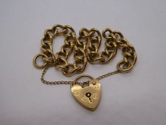 9ct yellow gold curblink bracelet with heart shaped padlock clasp and safety chain, marked 375, 18.2