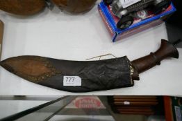 An ornamental Gurkha knife and sheath