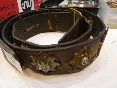 A WW2 hate belt having 23 British regimental badges