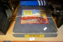A Hornby O Gauge train set and box track