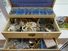 Cream jewellery box containing costume jewellery white metal bangles, earrings, etc and large box of