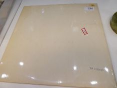 A copy of the Beatles White Album numbered 0165078