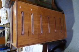 A vintage teak G-plan pillar chest having 6 drawers