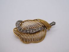 Antique yellow and white metal brooch in the form of a leaf, the midrib set with 16 old cut diamonds