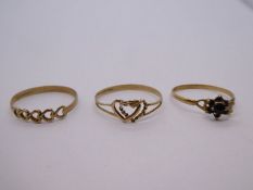 Two 9ct yellow gold rings, 1.7g approx, together with a 9ct sapphire cluster ring, 2.7g approx, mark