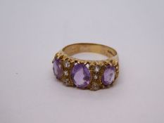 Antique 9ct yellow gold ring set with pale purple and clear stones, marked 375, size O/P, weight 4.6