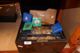A vintage wooden jewellery box and a selection of British crowns and coins, etc