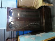 A Victorian Mahogany bookcase having glazed doors with long drawer under (no cornice)