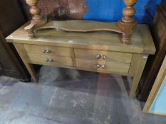 A modern oak sideboard having four drawers on square legs