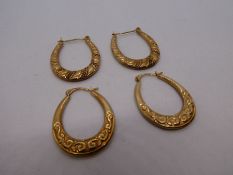 Two pairs of 9ct yellow gold Creole earrings, both marked, 2.1g approx
