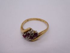 Pretty 9ct gold cross over design dress ring with central panel, inset with rubies and diamonds, siz