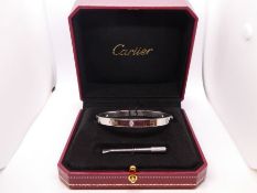 'CARTIER' 18ct white gold 'Love' bangle, set with six diamonds each approx 0.10 carat, (with origina