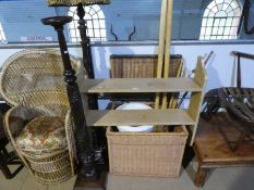 A wicker laundry basket, set of pine shelves and sundry