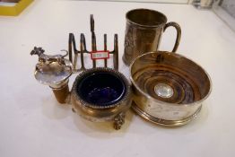 A collection of silver items to include a coaster hallmarked M C Hersey and Son ltd, London 1995, a