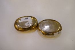 Two Victorian oval silver trinket boxes, one with engraved design on the lid. Hallmarks to include B