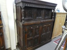 An early 20th century, carved oak court cupboard, 146cm