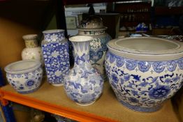 Collection of large oriental china including dragon decorated lidded jar, blue and white vase, etc