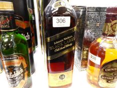 Johnnie Walker, a bottle of Black Label whisky, 1 litre and one other Black Label bottle from Singap