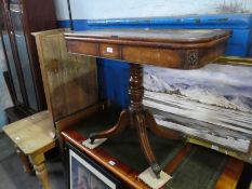 A 19th century mahogany fold over card table having rosewood crossbanded decoration