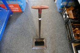 Long handled boot scraper and brush