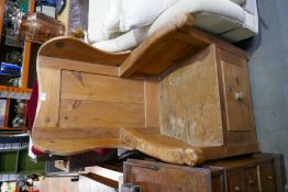 A pine wing back chair having box seat and a chest of drawers