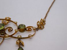 Pretty antique yellow gold necklace with floral decorated central panel inset with peridot and seed
