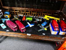 Shelf of Dinky vehicles and aircraft, some reproduction boxes