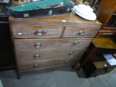 A Georgian Mahogany chest having two short and three long drawers on splay legs