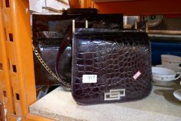 Two vintage ladies handbags, crocodillian design, one made for "Harrods"