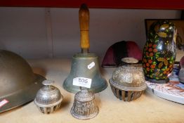 A set of brass bells including heavy brass school bell plus temple bell