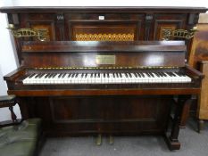 A Victorian Rosewood iron framed upright piano by Hopkinson, London