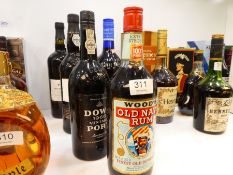 Four bottles of vintage Port to include Dow's 1966 bottle, and three other bottles of alcohol